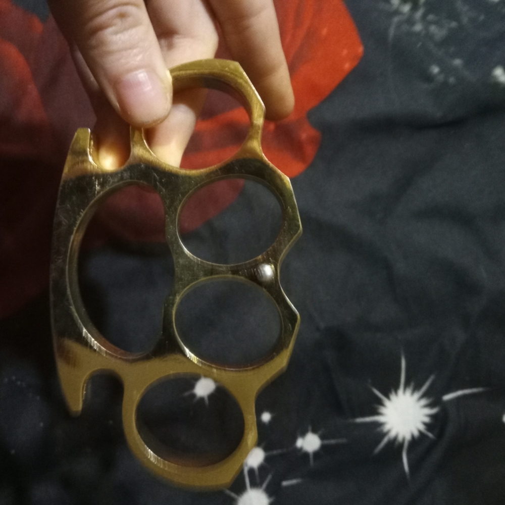 Gold brass knuckles